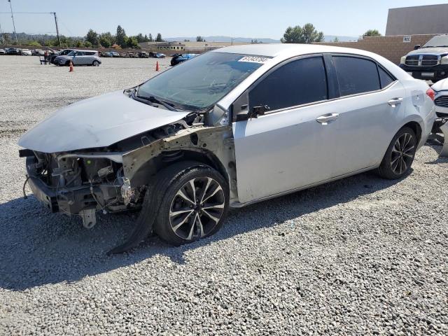 TOYOTA COROLLA L 2017 with VIN 2T1BURHE5HC755390 - Photo from auction