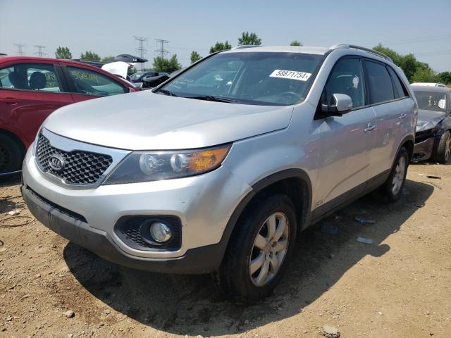 KIA SORENTO LX 2013 with VIN 5XYKTCA64DG395126 - Photo from auction