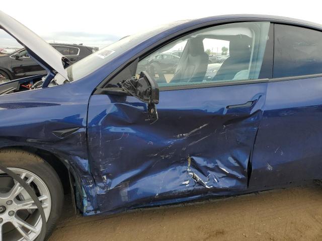 Photo 7 from auction – 2023 TESLA MODEL Y with VIN 7SAYGDEE7PA174654