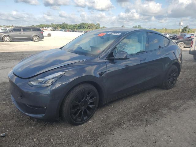 TESLA MODEL Y 2022 with VIN 7SAYGDEE6NF446319 - Photo from auction