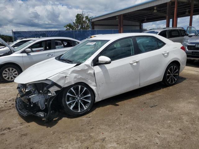 TOYOTA COROLLA L 2017 with VIN 2T1BURHE5HC900640 - Photo from auction