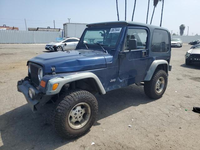 JEEP WRANGLER / TJ 2000 with VIN 1J4FA49SXYP773090 - Photo from auction