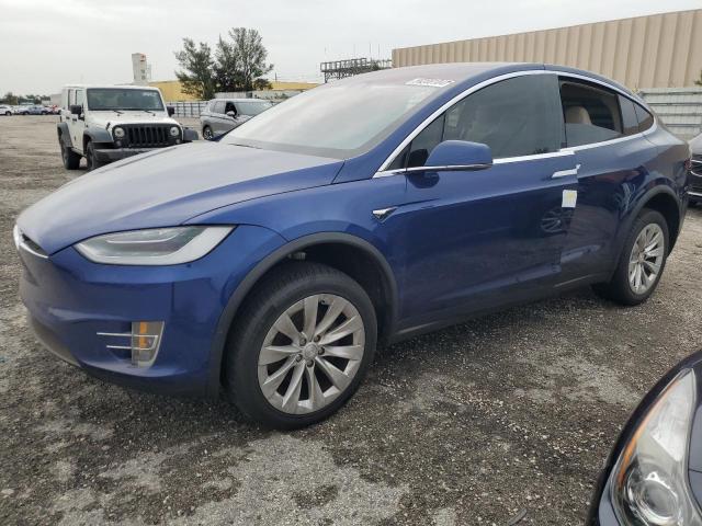 TESLA MODEL X 2018 with VIN 5YJXCDE2XJF111763 - Photo from auction