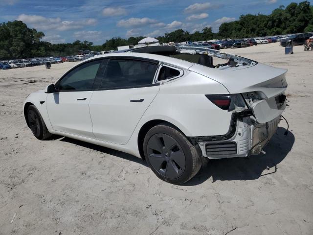 Photo 2 from auction – 2022 TESLA MODEL 3 with VIN 5YJ3E1EB8NF328497