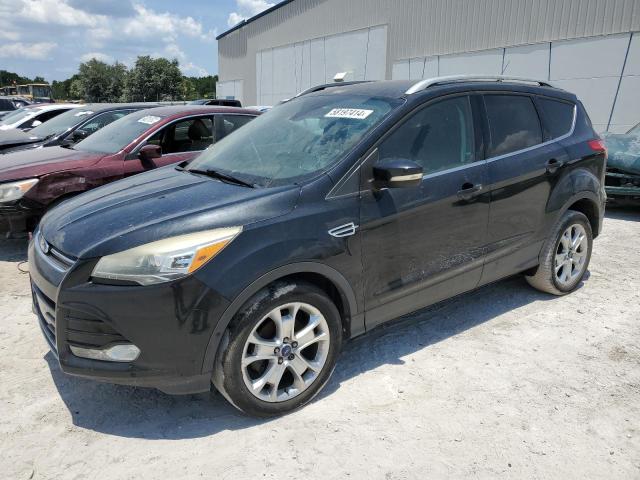 FORD ESCAPE TIT 2014 with VIN 1FMCU0JX0EUC06928 - Photo from auction