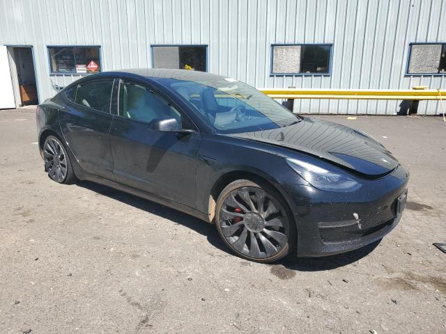 Photo 4 from auction – 2022 TESLA MODEL 3 with VIN 5YJ3E1EC2NF357809