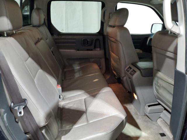 Photo 10 from auction – 2011 HONDA RIDGELINE with VIN 5FPYK1F50BB004700
