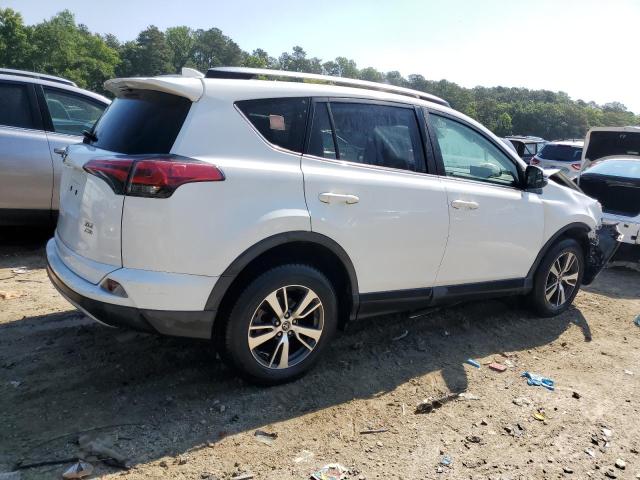 Photo 3 from auction – 2017 TOYOTA RAV4 XLE with VIN JTMRFREV8HD216858