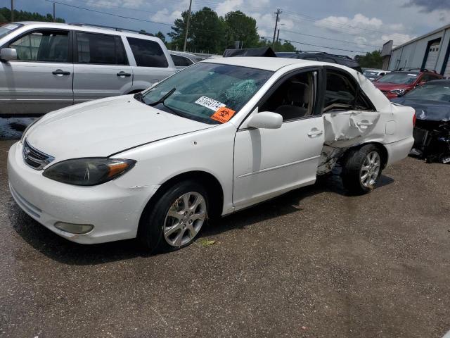 TOYOTA CAMRY LE 2004 with VIN JTDBE32K640249791 - Photo from auction