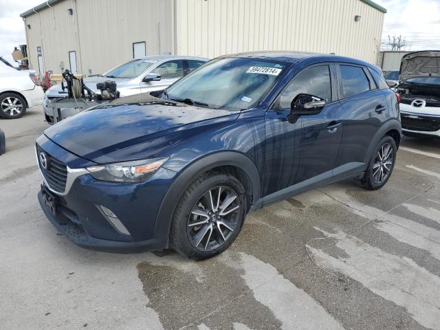 MAZDA CX-3 TOURI 2018 with VIN JM1DKDC79J0331785 - Photo from auction