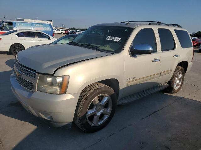 CHEVROLET TAHOE C150 2011 with VIN 1GNSCAE01BR229680 - Photo from auction