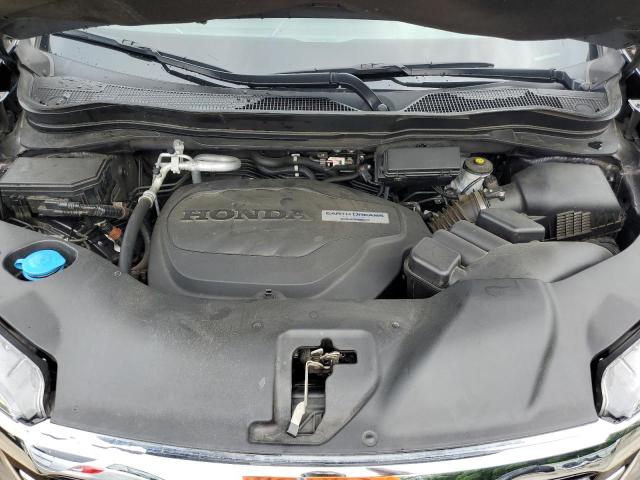 Photo 12 from auction – 2017 HONDA PILOT TOUR with VIN 5FNYF5H96HB001555