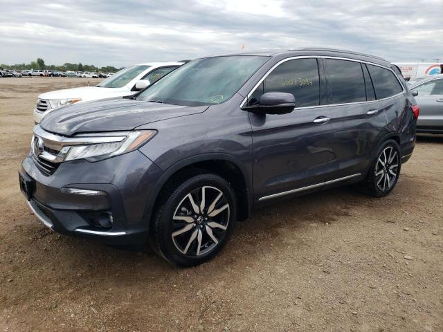 HONDA PILOT TOUR 2019 with VIN 5FNYF5H62KB011917 - Photo from auction