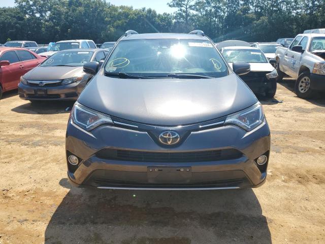 Photo 5 from auction – 2017 TOYOTA RAV4 XLE with VIN JTMRFREV4HJ714170