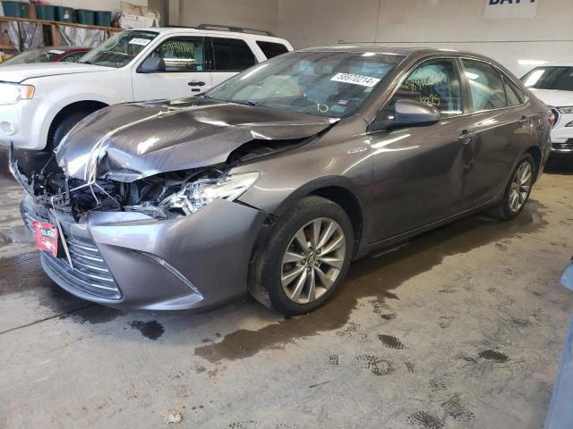 TOYOTA CAMRY HYBR 2016 with VIN 4T1BD1FK0GU189971 - Photo from auction