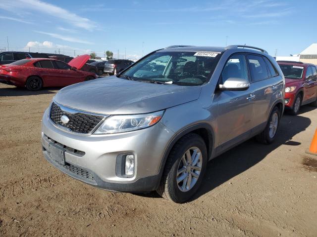 KIA SORENTO LX 2015 with VIN 5XYKTCA63FG558285 - Photo from auction