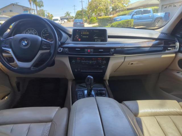 Photo 9 from auction – 2015 BMW X5 XDRIVE5 with VIN 5UXKR6C5XF0J77705