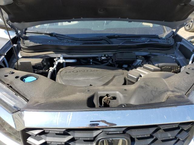 Photo 11 from auction – 2023 HONDA PASSPORT E with VIN 5FNYF8H52PB032850