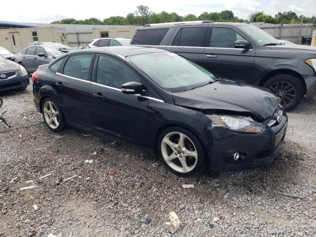Photo 4 from auction – 2014 FORD FOCUS TITA with VIN 1FADP3J25EL165262
