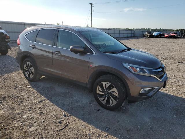 Photo 4 from auction – 2016 HONDA CR-V TOURI with VIN 5J6RM4H94GL095915