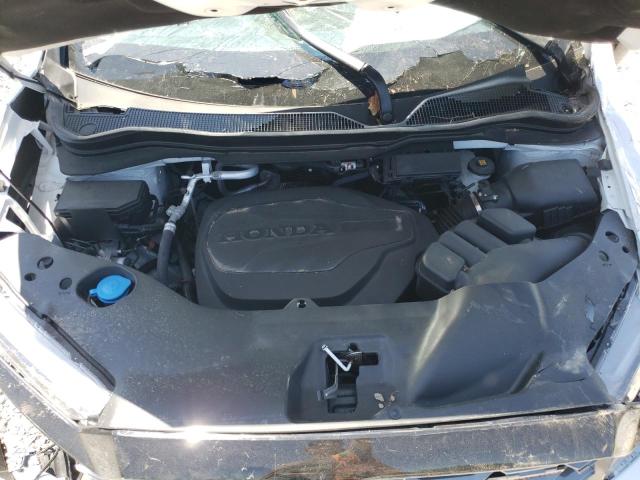 Photo 12 from auction – 2023 HONDA PASSPORT T with VIN 5FNYF8H67PB044288