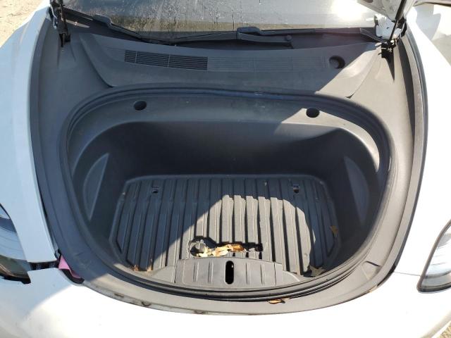 Photo 11 from auction – 2020 TESLA MODEL 3 with VIN 5YJ3E1EA7LF794166