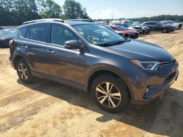 Photo 4 from auction – 2017 TOYOTA RAV4 XLE with VIN JTMRFREV4HJ714170
