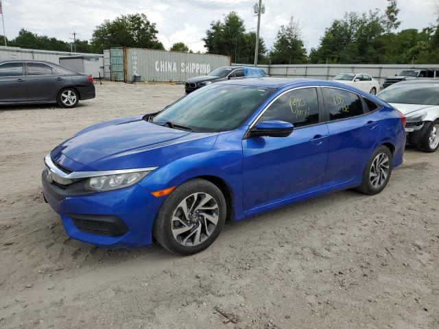 HONDA CIVIC EX 2018 with VIN 19XFC2F71JE033616 - Photo from auction