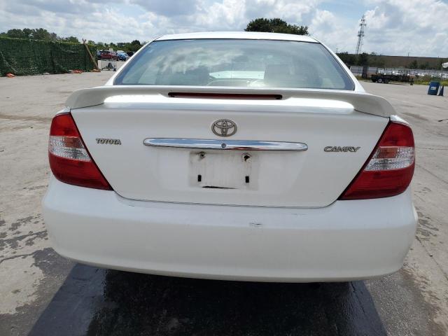 Photo 6 from auction – 2004 TOYOTA CAMRY LE with VIN JTDBE32K040259829