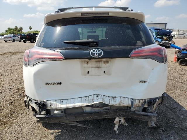 Photo 6 from auction – 2016 TOYOTA RAV4 SE with VIN JTMNFREVXGJ075712