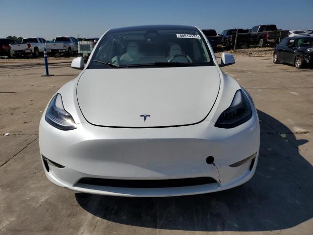 Photo 5 from auction – 2023 TESLA MODEL Y with VIN 7SAYGDED3PF943385
