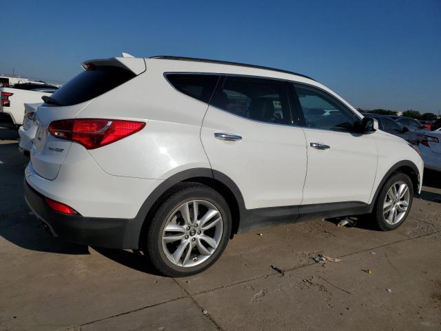 Photo 3 from auction – 2014 HYUNDAI SANTA FE S with VIN 5XYZU3LA2EG220176