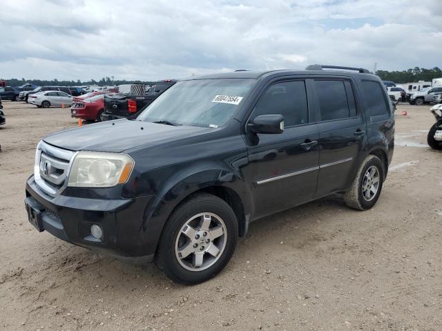 HONDA PILOT TOUR 2009 with VIN 5FNYF38959B026016 - Photo from auction
