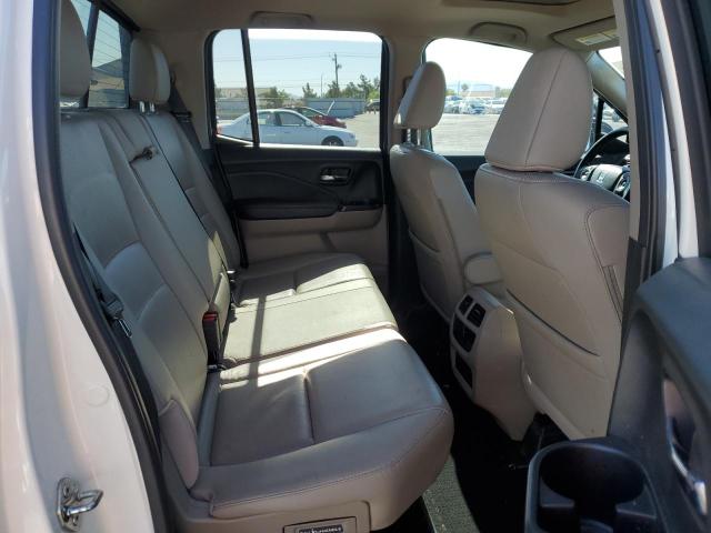 Photo 10 from auction – 2018 HONDA RIDGELINE with VIN 5FPYK3F70JB002893