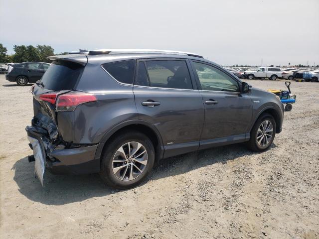 Photo 3 from auction – 2018 TOYOTA RAV4 HV LE with VIN JTMRJREV9JD240297