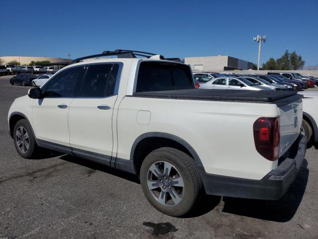 Photo 2 from auction – 2018 HONDA RIDGELINE with VIN 5FPYK3F70JB002893