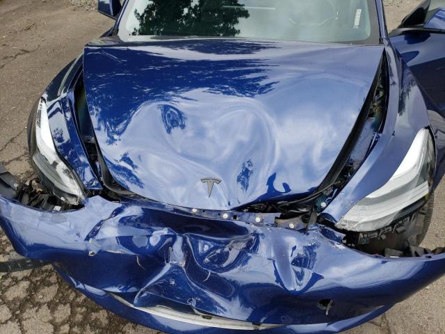 Photo 11 from auction – 2022 TESLA MODEL 3 with VIN 5YJ3E1EB8NF343193