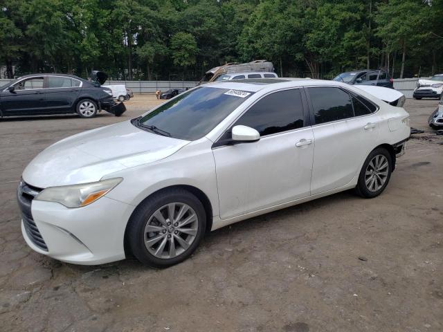 TOYOTA CAMRY LE 2016 with VIN 4T1BF1FKXGU529931 - Photo from auction