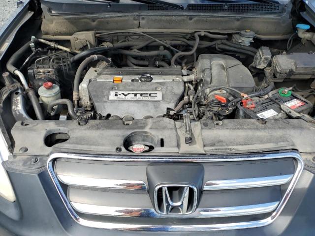 Photo 11 from auction – 2006 HONDA CR-V LX with VIN JHLRD78586C813309