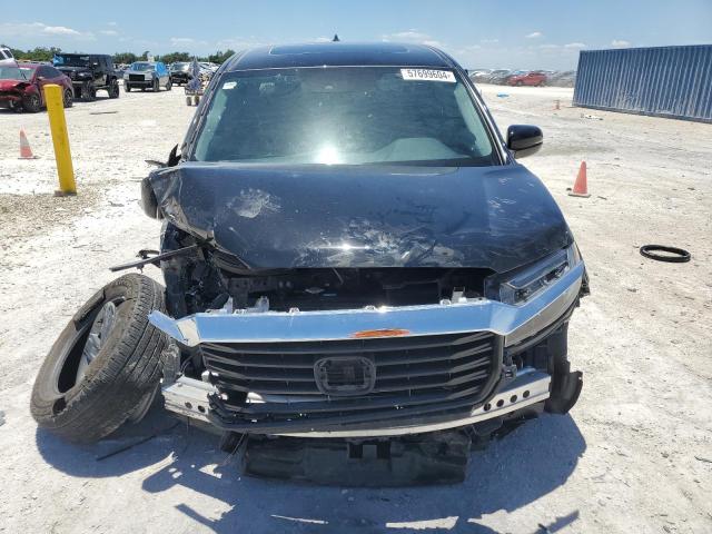 Photo 5 from auction – 2023 HONDA RIDGELINE with VIN 5FPYK3F52PB037443