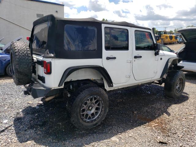 Photo 3 from auction – 2014 JEEP WRANGLER U with VIN 1C4BJWEG0EL128646