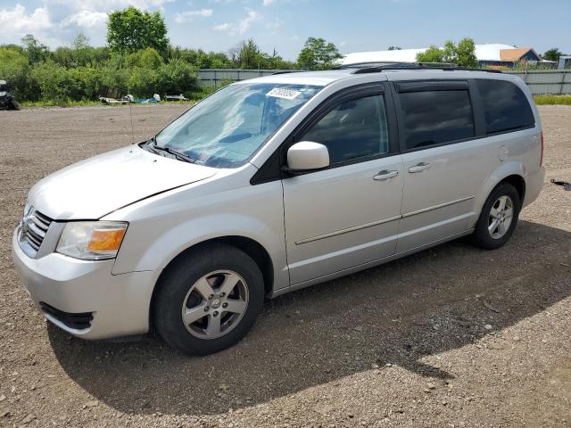 DODGE GRAND CARA 2010 with VIN 2D4RN5D11AR355455 - Photo from auction