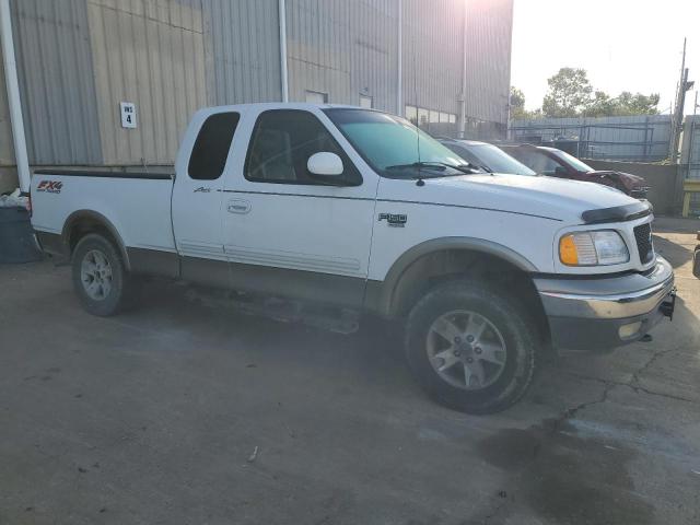 Photo 4 from auction – 2002 FORD F150 with VIN 1FTRX18L42NA59517