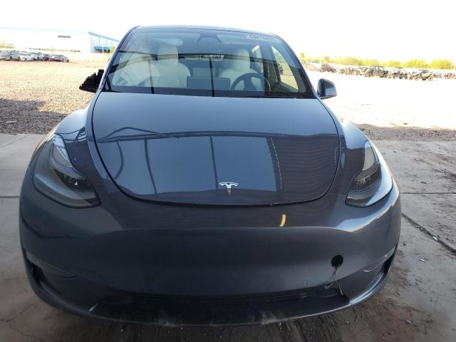 Photo 5 from auction – 2022 TESLA MODEL Y with VIN 7SAYGDEF6NF398880
