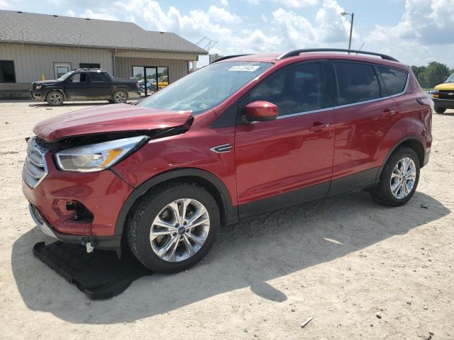 FORD ESCAPE SE 2018 with VIN 1FMCU9GD4JUA64174 - Photo from auction