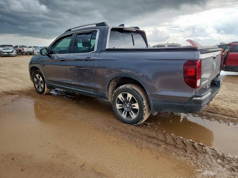 Photo 2 from auction – 2019 HONDA RIDGELINE with VIN 5FPYK3F66KB008609