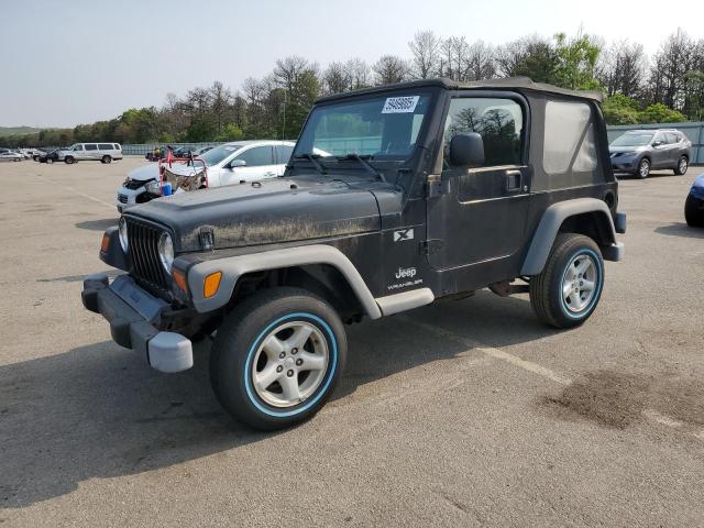 JEEP WRANGLER COMMANDO 2003 with VIN 1J4FA39S23P359983 - Photo from auction