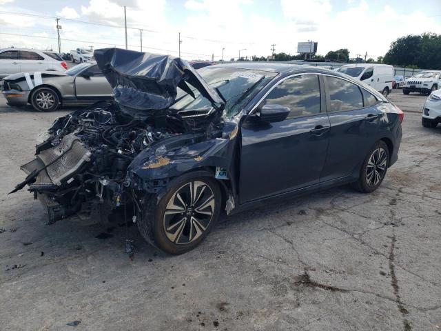 HONDA CIVIC EX 2018 with VIN JHMFC1F35JX007431 - Photo from auction