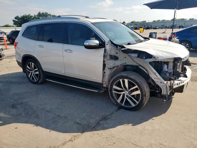 Photo 4 from auction – 2016 HONDA PILOT ELIT with VIN 5FNYF6H00GB040423