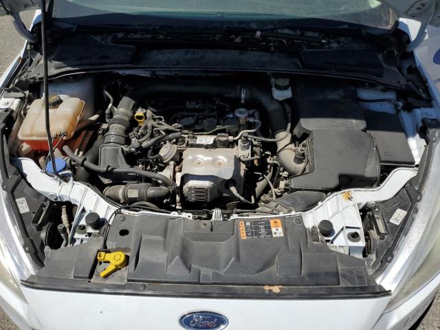 Foto 11 de la subasta – 2018 FORD FOCUS SE con VIN 1FADP3FE8JL293413